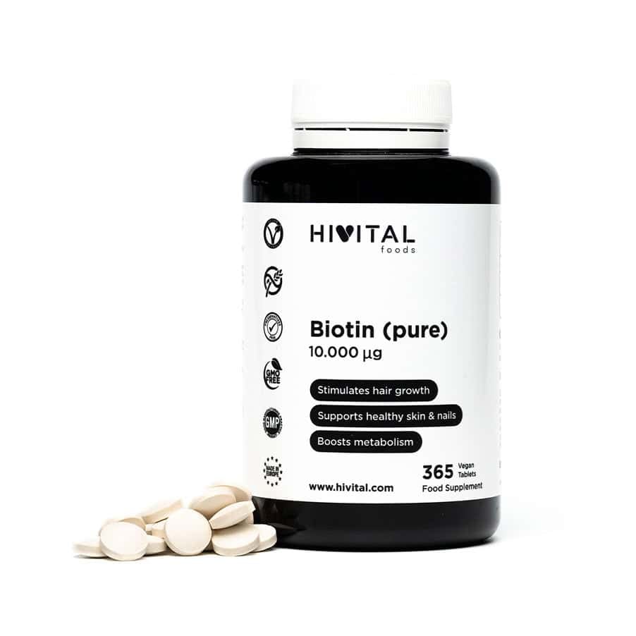 Frasco de 365 comprimidos de biotina pura de 10000 mg de la marca Hivital, un suplemento para la salud del cabello, la piel y las uñas.