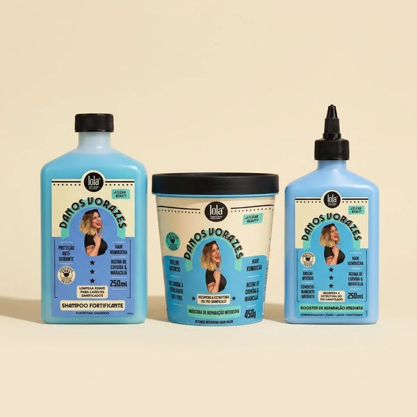 Pack Danos Vorazes Lola com shampoo e máscara capilar para reparação intensa dos cabelos danificados.