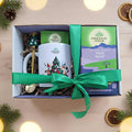 Infusión ayurvédica Tulsi Sleep Organic India en envase navideño, con una relajante mezcla orgánica y elementos festivos.