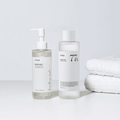 Heartleaf Duo Kit Anua 200ml + 250ml, conjunto com óleo de limpeza Heartleaf Pore Control e tónico Heartleaf 77% para limpar, acalmar e hidratar a pele.
