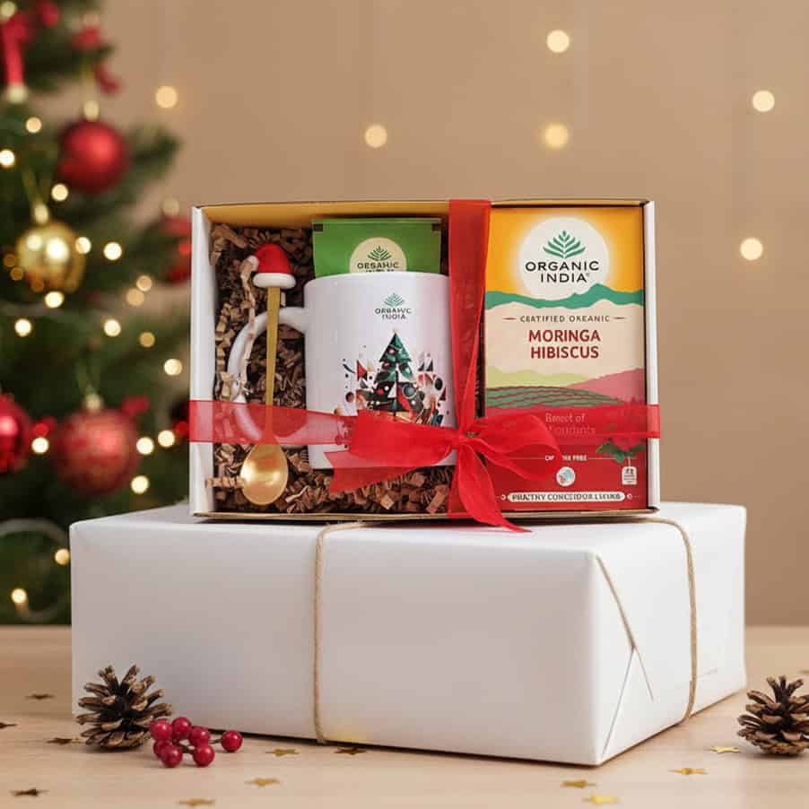 Infusão ayurvédica Moringa Hibiscus Organic India em embalagem de Natal, com mistura herbal biológica e design festivo.