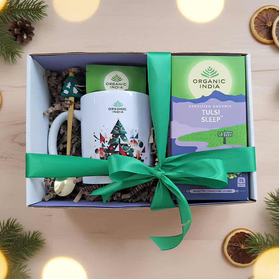 Infusão ayurvédica Tulsi Sleep Organic India em embalagem de Natal, com mistura biológica relaxante e elementos festivos.