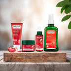 Pack Rosto e Corpo de Romã Weleda com creme de dia reafirmante, sérum facial, creme de mãos e óleo corporal regenerador.
