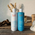 Set reparador e hidratante Moroccanoil com shampoo, condicionador e tratamento de óleo de argão para nutrir e fortalecer o cabelo.
