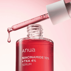 Frasco de Sérum Niacinamida 10% + TXA 4% 30ml de Anua, tratamiento facial para unificar el tono de la piel y reducir las manchas.